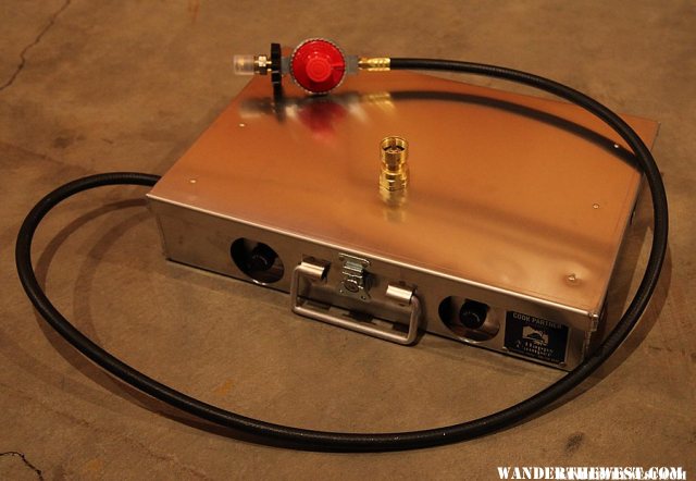 Partner stove with hose, regulator, and optional adapter for one pound propane cylinders