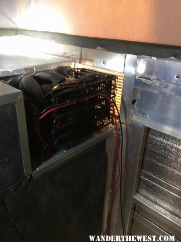 How compressor bits on fridge fit new vent opening