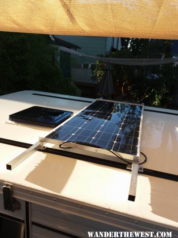 Flexible solar panel mounted to the roof