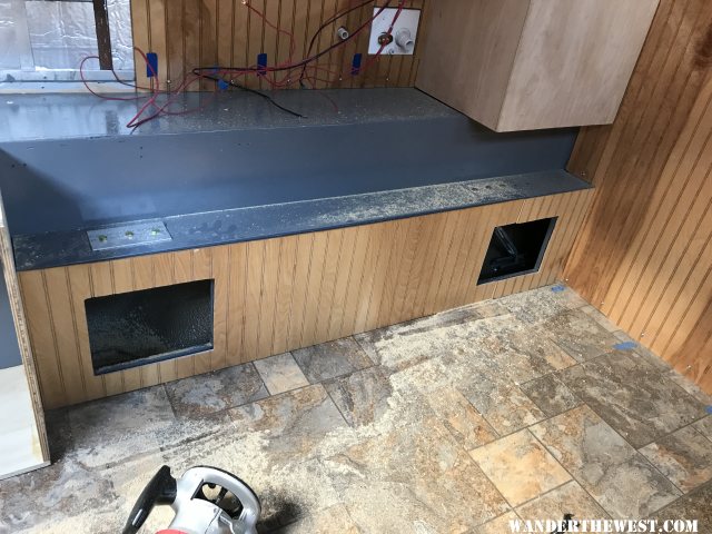 Installed bead board under counter space