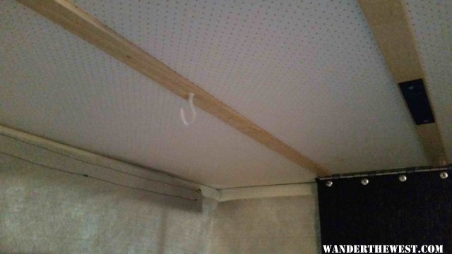 Coat hook in ceiling