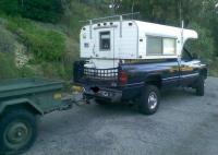 Alaskan camper and quarter ton military trailer.jpg